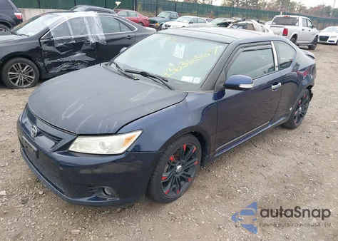 2011 Scion Tc z USA, uszkodzony, nr VIN JTKJF5C72B3013190